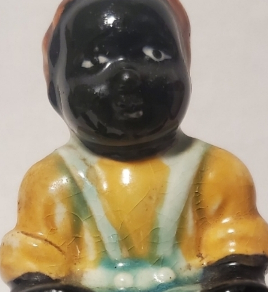 Sitting boy salt shaker
